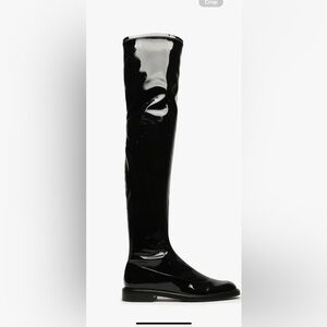Schutz kaolin over the knee patent boots.